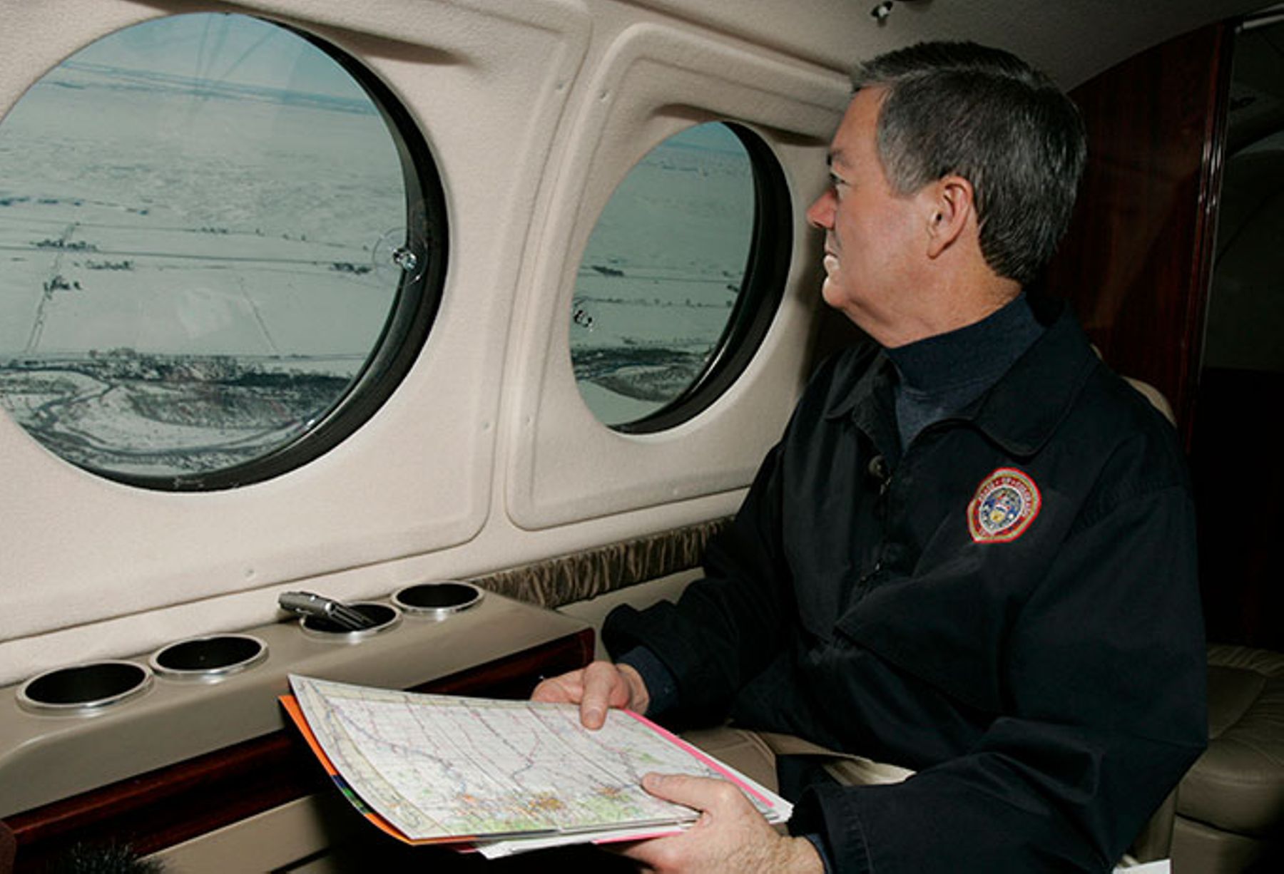 Colorado Gov. Bill Owens views the blanket of snow over southeast Colorado during a fly over of the area near Springfield, CO. 12-31-2006.
