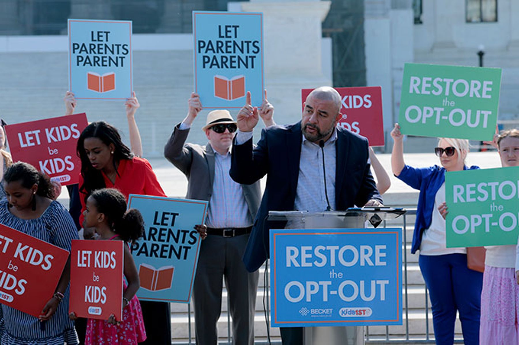 Parents advocate for religious rights outside the Supreme Court during arguments in Mahmoud v. Taylor in 2025.