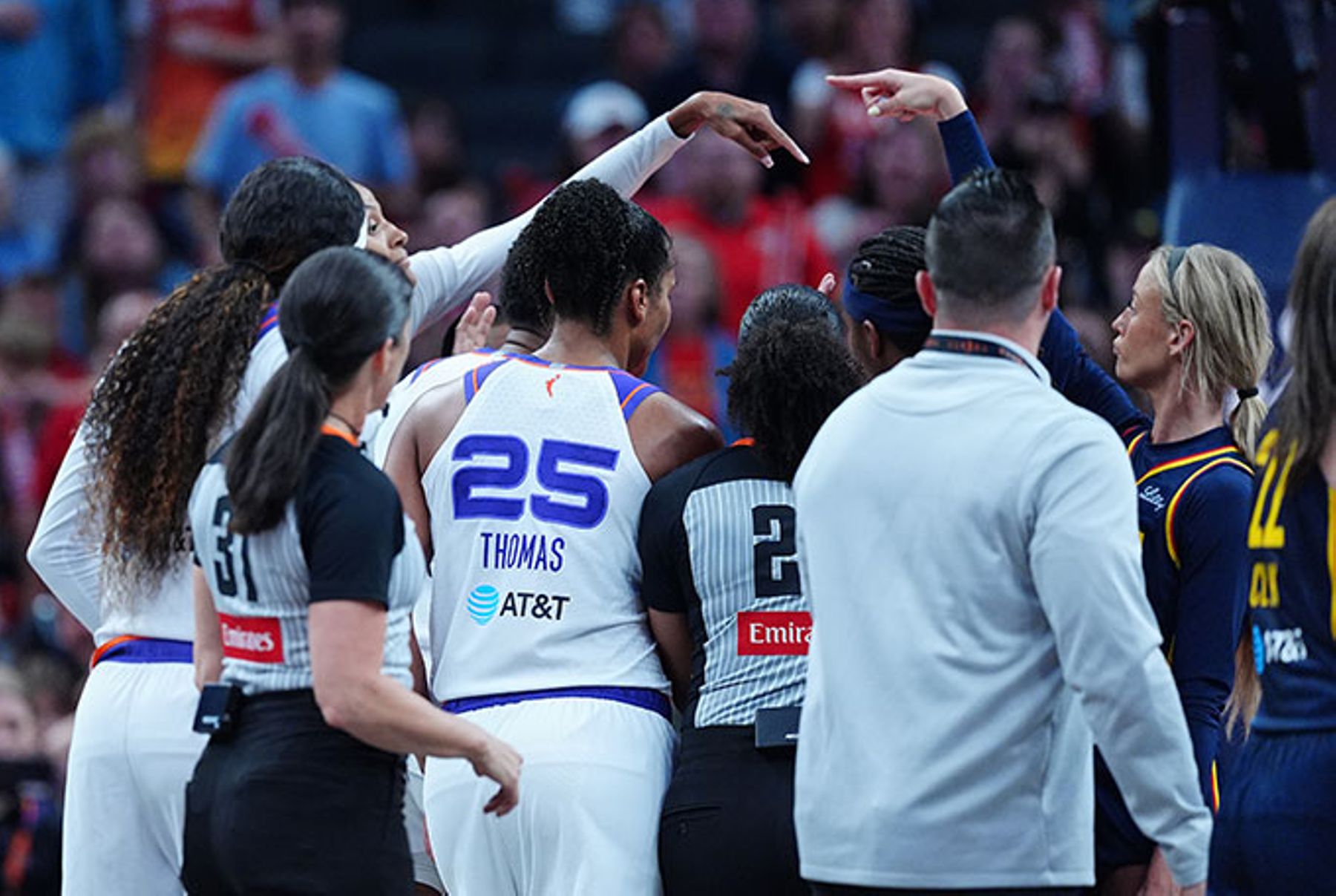 Indiana Fever guard Sophie Cunningham (8) and Phoenix Mercury forward DeWanna Bonner (24) exchange words and point out each other on June 22, 2026, at Gainbridge Fieldhouse in Indianapolis, Indiana.