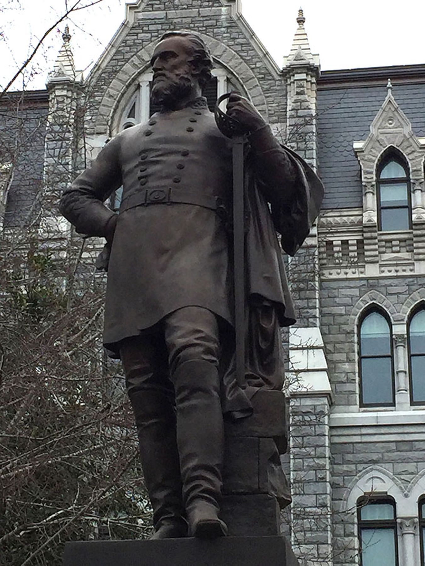 The Stonewall Jackson monument in Richmond&rsquo;s Capitol Square, which faces likely banishment, with the Old City Hall in the background.