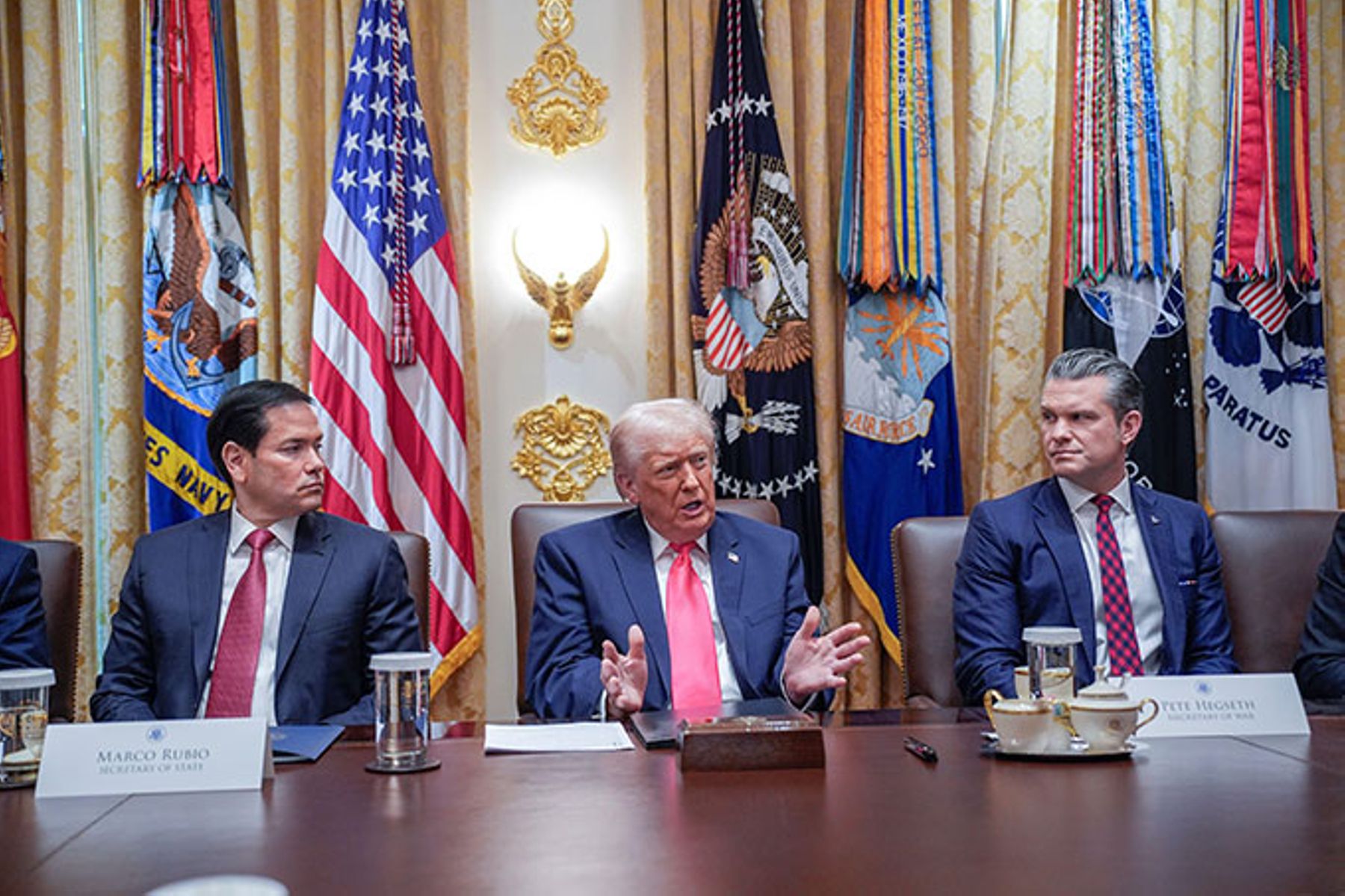 Trump makes opening remarks as he holds a meeting with his Cabinet in the White House December 2, 2025.