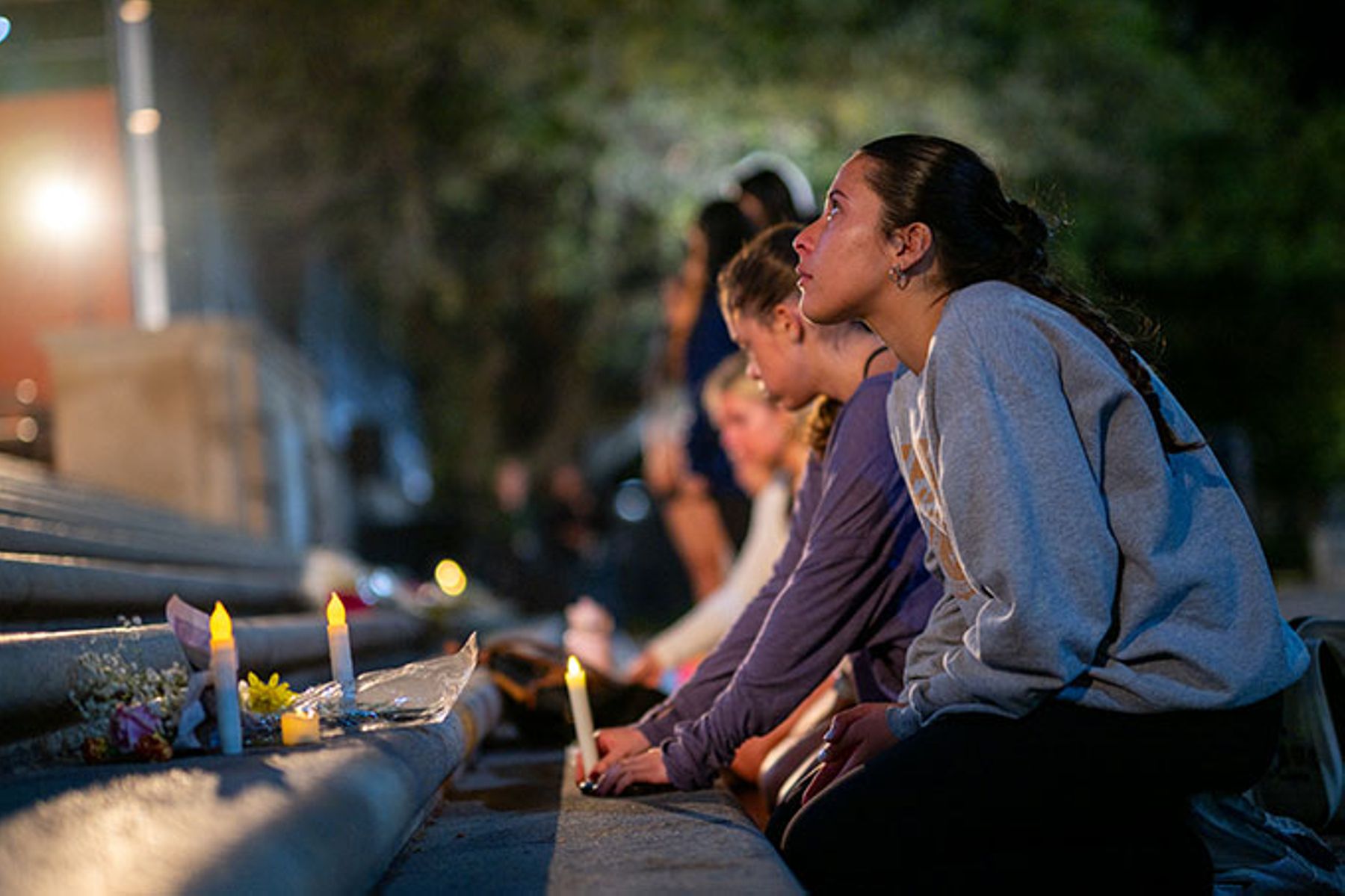 UT Austin students gather for a candlelight vigil for the victims of the mass shooting in Austin, Texas.