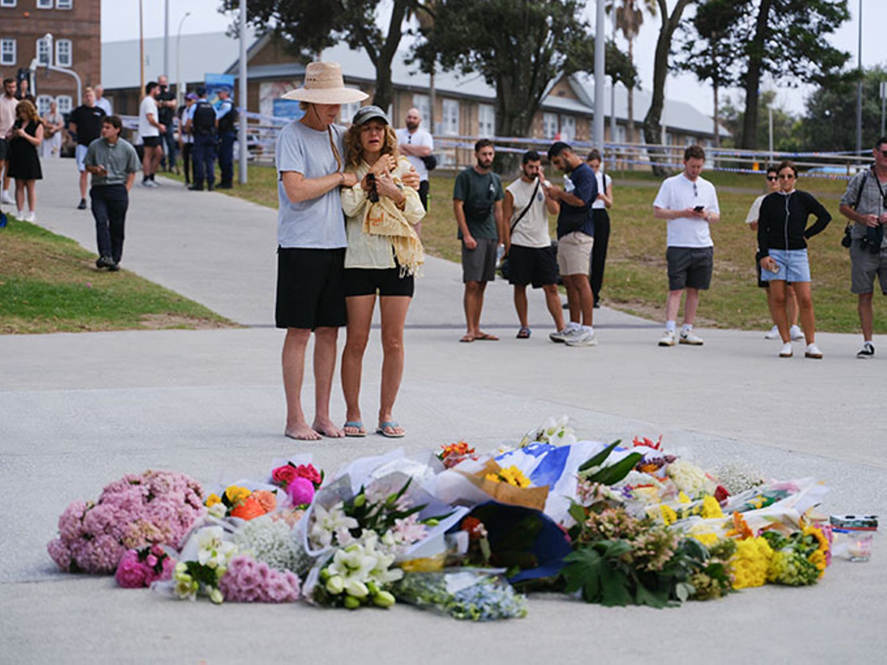 Visitors to Bondi Pavilion lay flowers at Bondi Beach.
