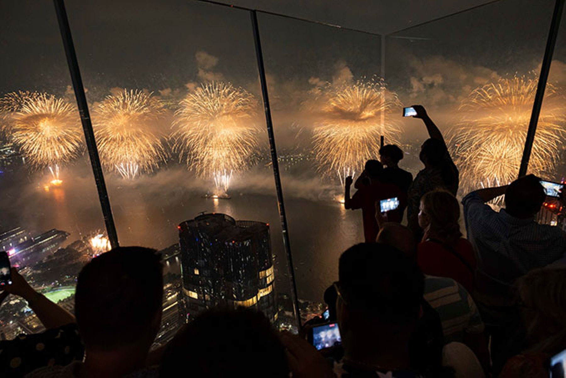 New York City skyline with fireworks.
