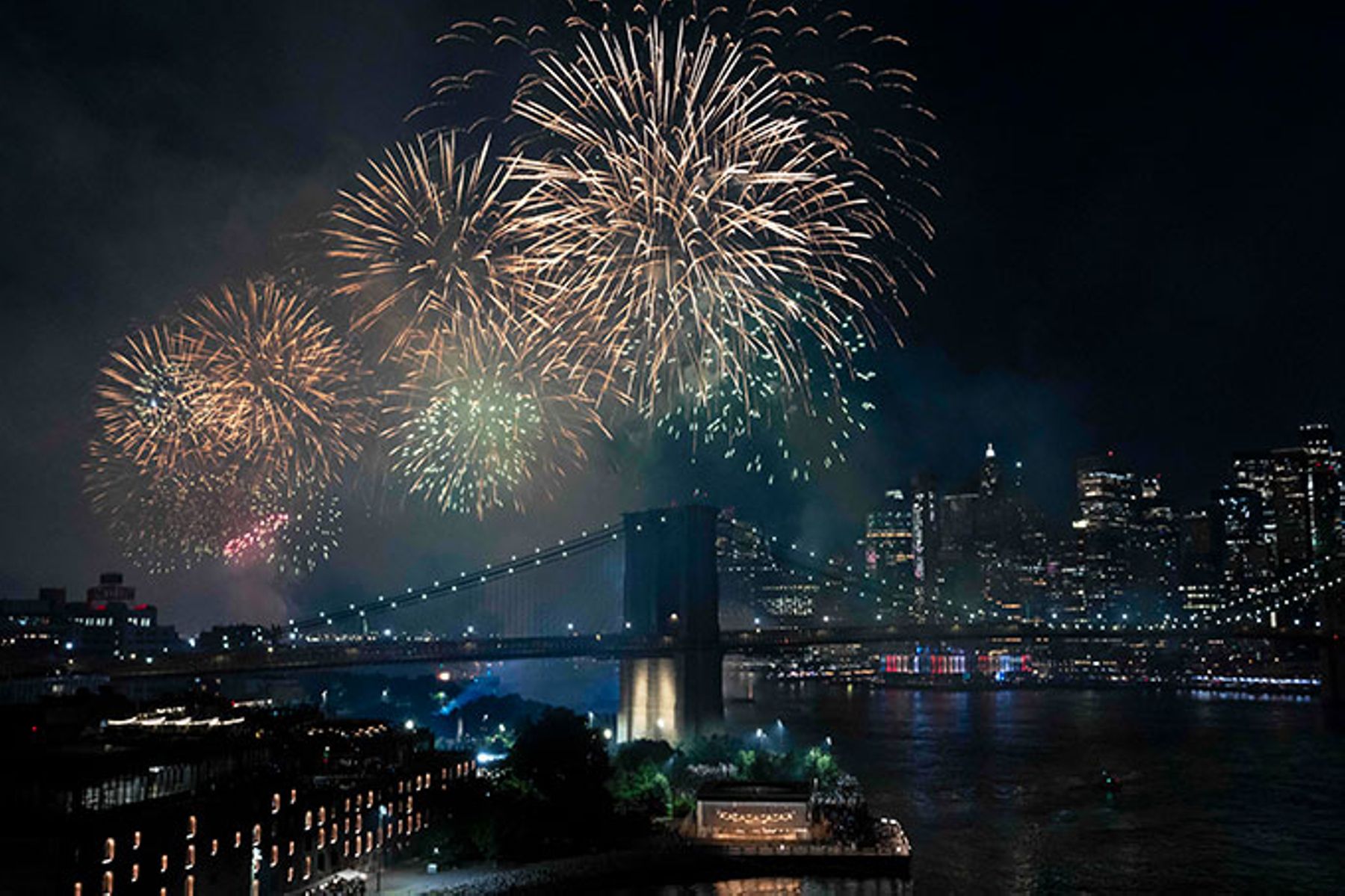 New York City skyline with fireworks.