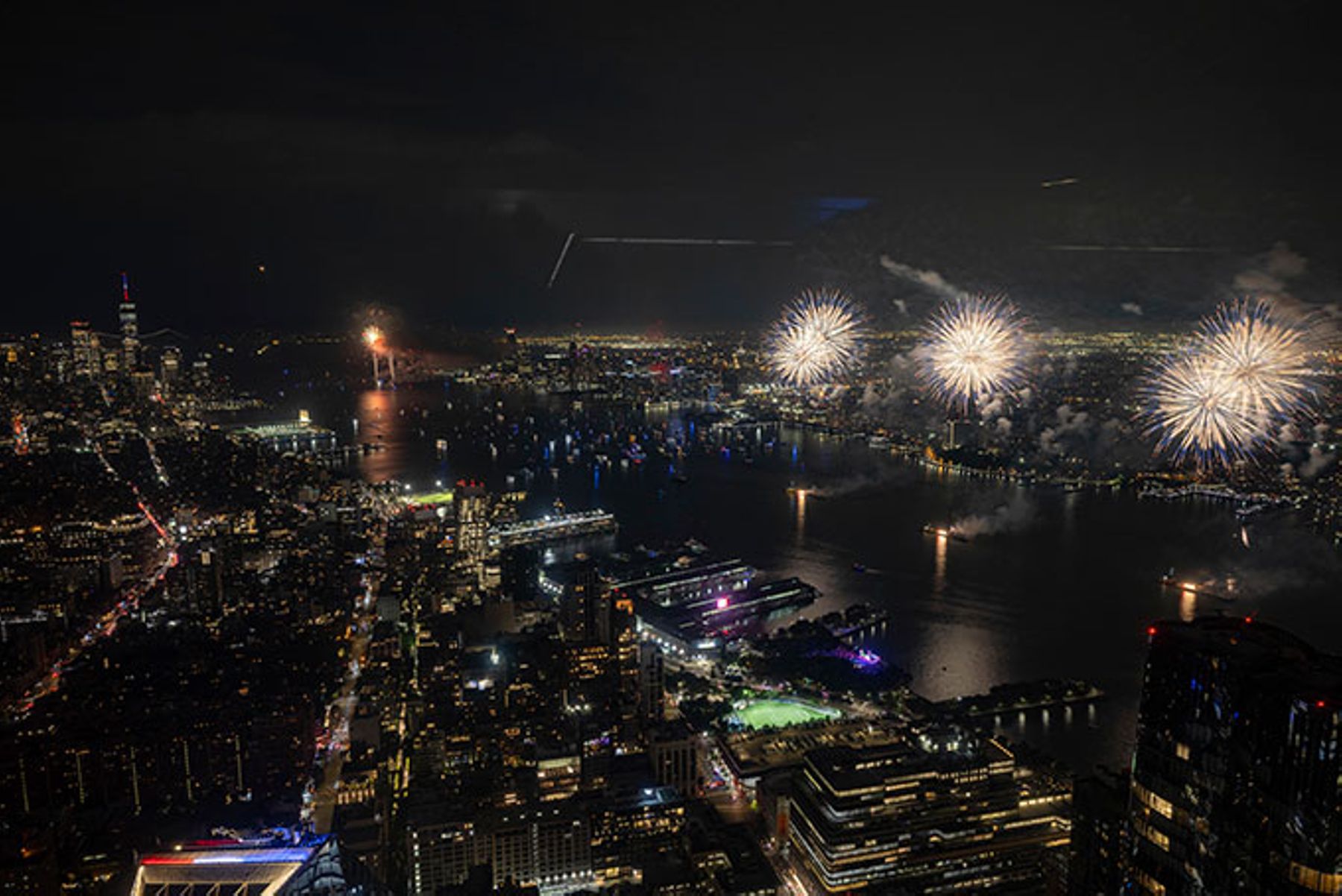 New York City skyline with fireworks.